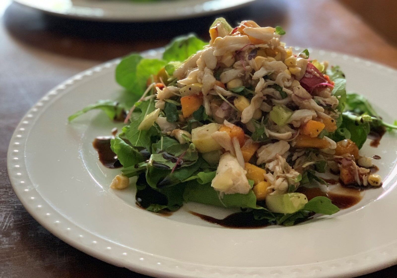 Summer Peach and Crab Relish over Market Greens- recipe