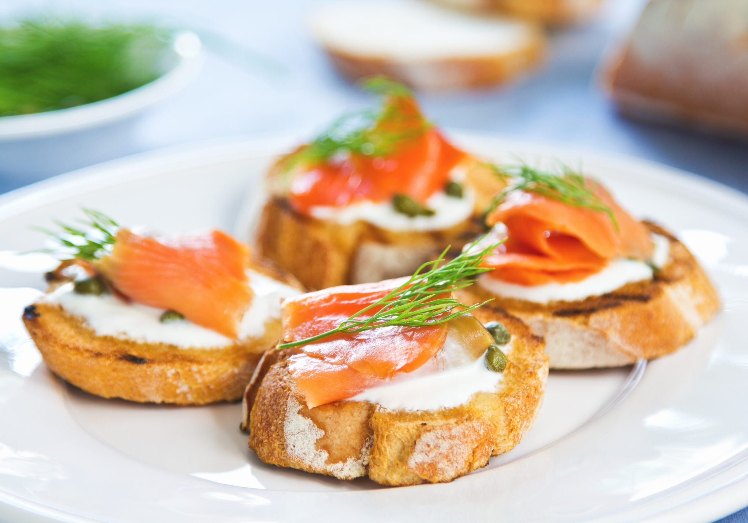 Smoked salmon crostini with cheese,caper and dill